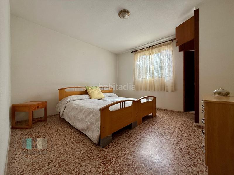 Foto 52901562-f805-40ff-8ac3-d22d52a8c70d. Casa aparellada amb aparcament a Heliópolis Benicasim / Benicàssim