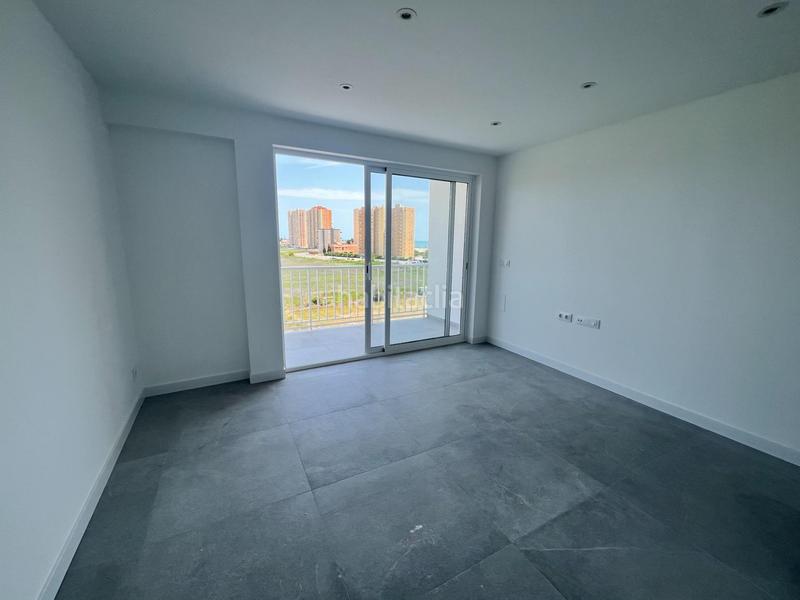 Foto a4e31cda-aad1-4056-b642-a7ed363c799c. Flat with pool in Platja de la Pobla de Farnals Pobla de Farnals (la)