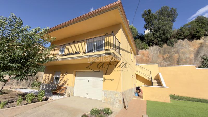 Foto 3900bf2e-648a-4b44-b010-e65f6a1bf45d. House with parking pool in Aiguaviva Parc Vidreres