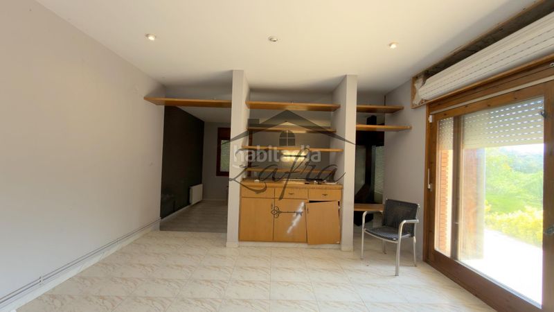 Foto 6595d8fd-d3ba-488e-9864-ed77388c6f01. Casa amb aparcament piscina a Caldes de Malavella