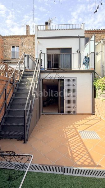 Foto 99c80c3b-8c39-4b64-9147-861b9eb19bef. Casa adossada amb calefacció a Llagostera