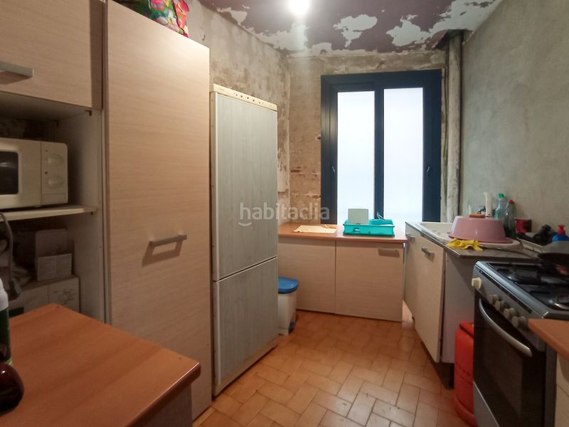 Foto 5eb355eb-fbd9-4946-a2fd-5858350948d1. Casa amb xemeneia a Eixample Sant Feliu de Guíxols