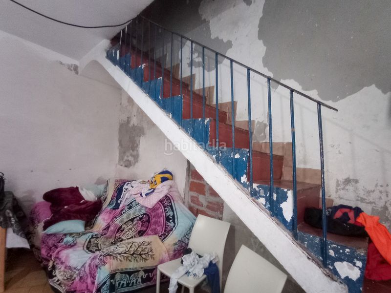 Foto deac36f0-d900-417b-a521-ed542422da90. Casa amb xemeneia a Eixample Sant Feliu de Guíxols