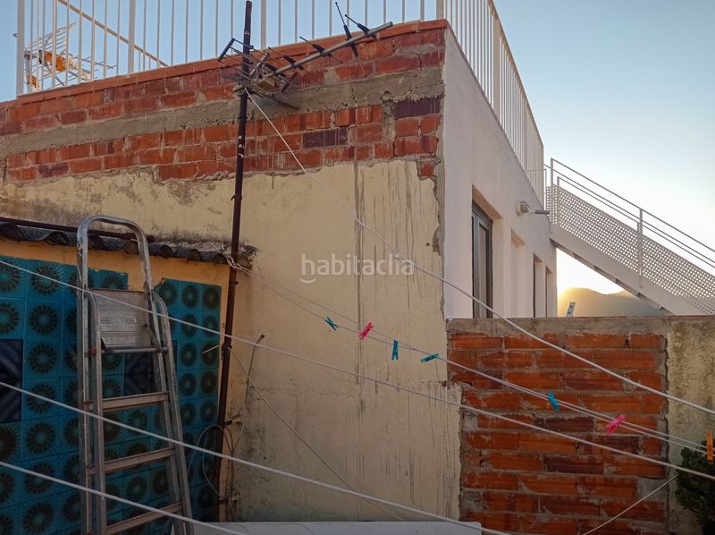 Foto ec9a6ea7-d1e5-4cbf-a0c5-e2f819512f80. Casa amb xemeneia a Eixample Sant Feliu de Guíxols