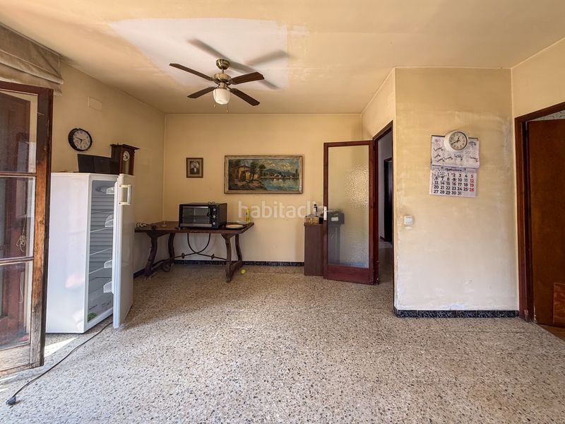 Foto b241d48f-d9f2-422a-b804-33db61b7b934. Casa adosada casa de pueblo pareada con jardín privado y gran potencial de reforma en Castell d´Aro