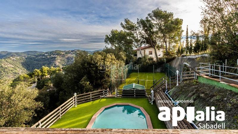 Foto ce699423-2408-4618-ab62-47d9217a8a5f. Chalet with parking pool in El Racó-Sant Feliu del Racó Castellar del Vallès