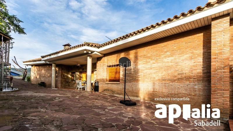 Foto 5bcb8334-875a-4557-8d8e-5b9a3f8344e7. Chalet avec parking piscine dans El Racó-Sant Feliu del Racó Castellar del Vallès