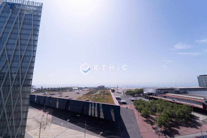 Foto e9b280c4-f0ee-4174-9b23-ac51b2e28270. Piso vivir el mar desde las alturas exclusiva residencia con terraza panorámica en torre antares en Barcelona