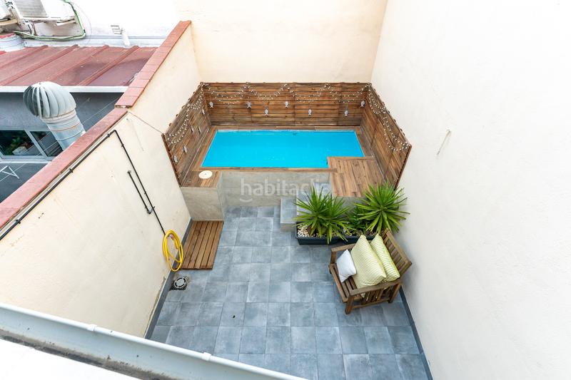 Foto 1d4654fc-c4e5-445c-9d33-7baf69c0985c. Casa adossada amb xemeneia calefacció aparcament piscina a Reus