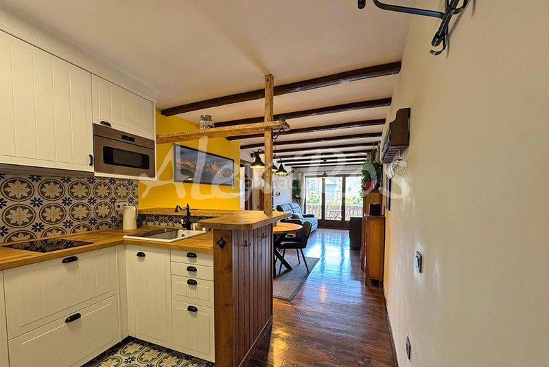 Foto 0c96875a-43f5-47f7-a8a0-fd21a38825c1. Apartamento  reformado con ascensor, parking y trasteros en Bellver de Cerdanya