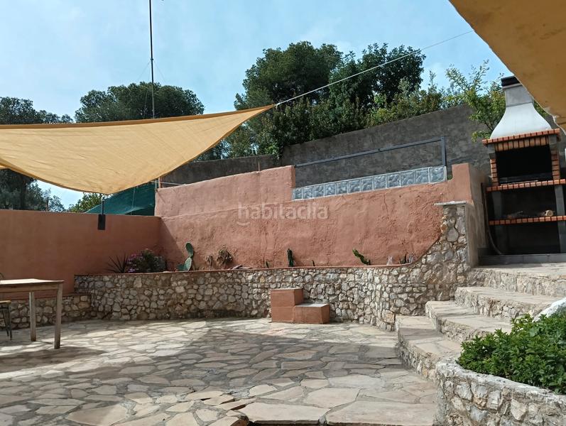 Foto 54b1ec2b-7fe5-469a-bc36-2b80fd99fa74. Casa amb xemeneia aparcament piscina a costa Cunit - els jardins - els rosers Cunit