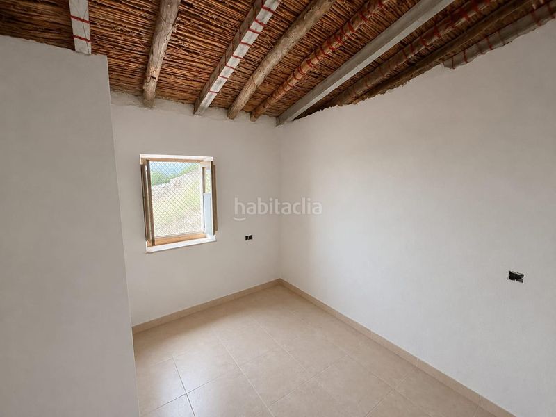 Foto b27541b5-c52f-451d-9624-ea8b006337c3. Casa adossada a Coy Lorca