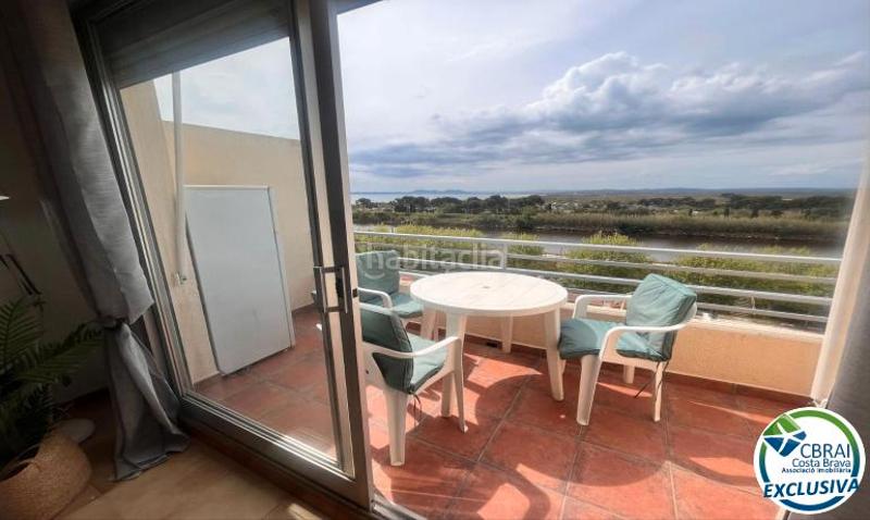 Foto 150a4ebb-7eb3-48c6-a33e-7e86b93d6f22. Estudio en carrer de la muga 175b grand studio avec terrasse et licence touristique en Empuriabrava