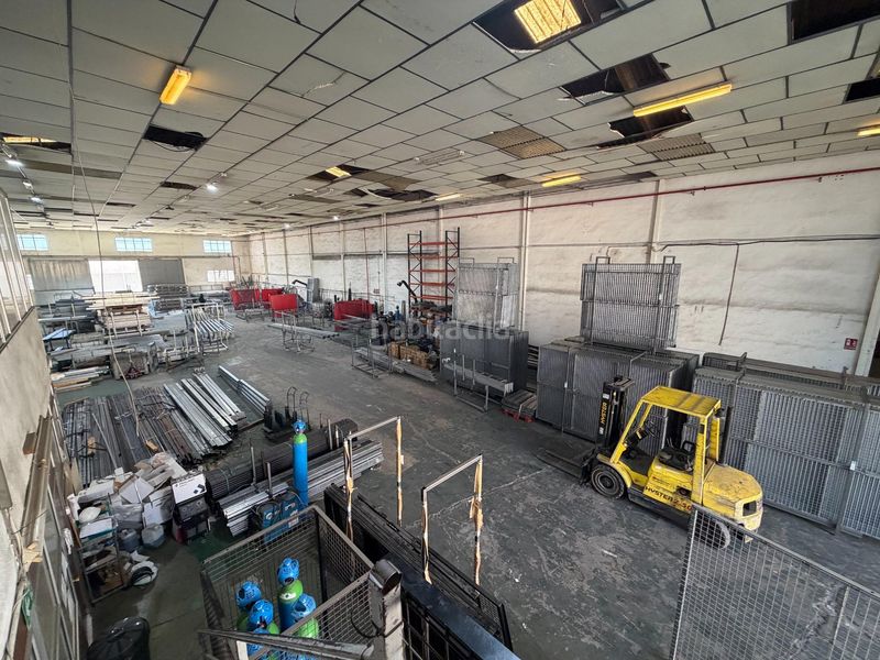 Foto d3d0d371-9e20-44f3-92d5-c79f0fdcb6c0. Nau industrial a Beniparrell