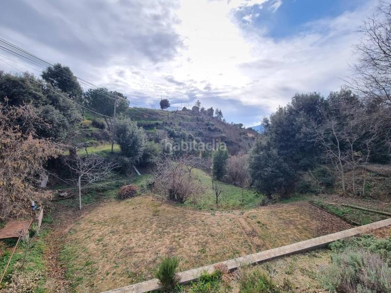 Foto 1f15bee0-8c17-47e5-8476-97bdd5c6082f. Casa fantástica casa de 265 mt2 con 2 plantas, 6 dormitorios, 4 baños y 3 hectáreas de terreno en Sant Hilari Sacalm