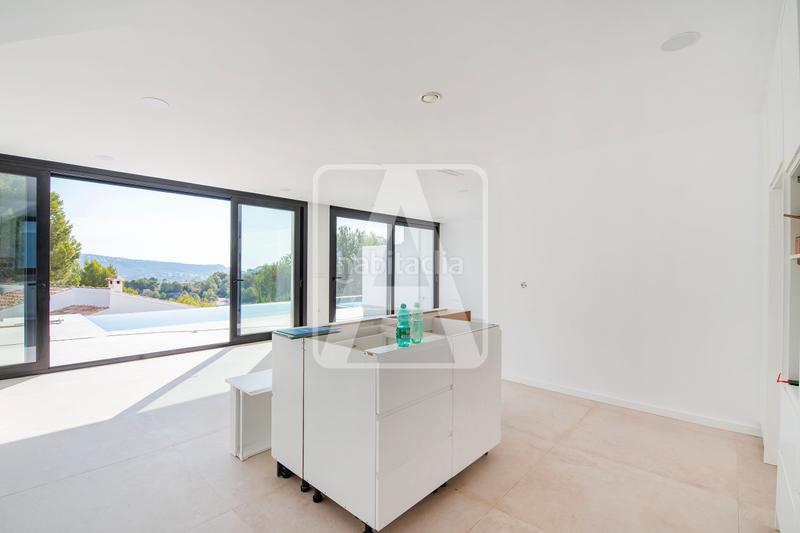 Foto 42014131-00ea-4ff8-ac1e-23515b52126e. Doppelhaus mit heizung pool in Benimeit-Tabaira Moraira