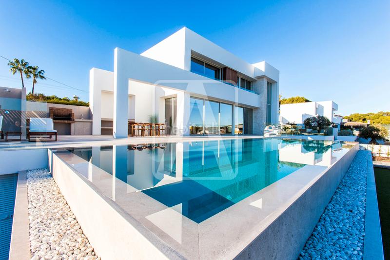 Foto 87148cb7-15ad-44fc-88f5-28c858e24772. Chalet avec cheminée parking piscine dans La Fustera Benissa