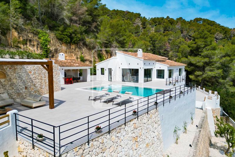 Foto 3cc9baaf-c03c-4364-b852-37439699bac1. Xalet amb xemeneia aparcament piscina a La Viña-Montemar-San Jaime Benissa