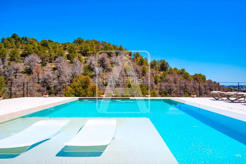 Foto ed51dfe2-a181-4593-bc1f-260f39328d21. Xalet amb xemeneia aparcament piscina a La Viña-Montemar-San Jaime Benissa