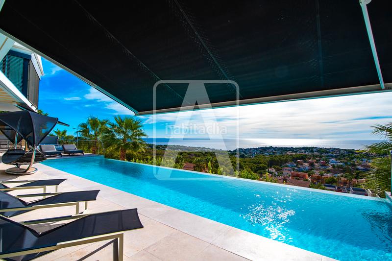 Foto 270b711d-e569-48c3-b58a-1da0439018bc. Chalet avec chauffage parking piscine dans Gran Sol Calp