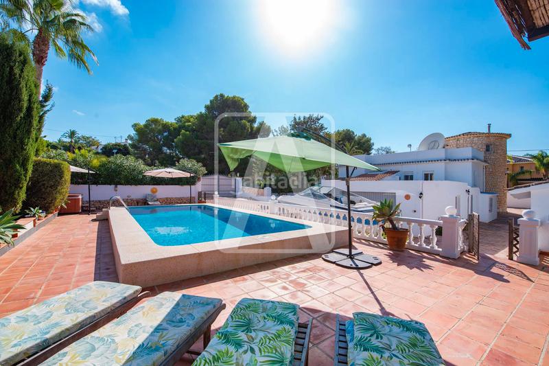 Foto c8f6cd47-26b3-42be-9b9c-847d11e58810. Chalet con camino riscaldamento parcheggio piscina in Calp