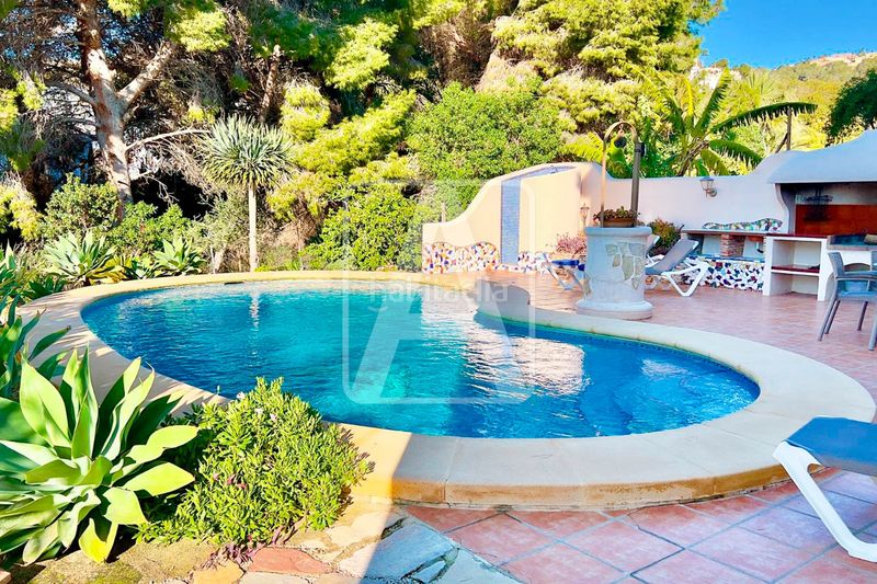 Foto 0c49f9bd-497f-46dc-b65c-2ba3897dc2b1. Chalet en La Viña-Montemar-San Jaime Benissa