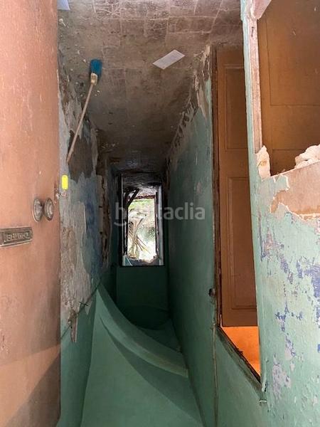 Foto 767b358c-4da1-470b-a695-a4b2a3570e11. Masia a carrer travessia ciutadella 11 a Tortellà