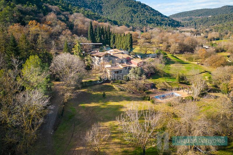 Foto e2a8e782-6c34-4755-8772-a3fda675fc1e. Bauernhof mit kamin heizung parking pool in Camós