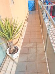 Pis a Centre. tico soleado de 3 habitaciones, 2 baos y buahardilla en el cen