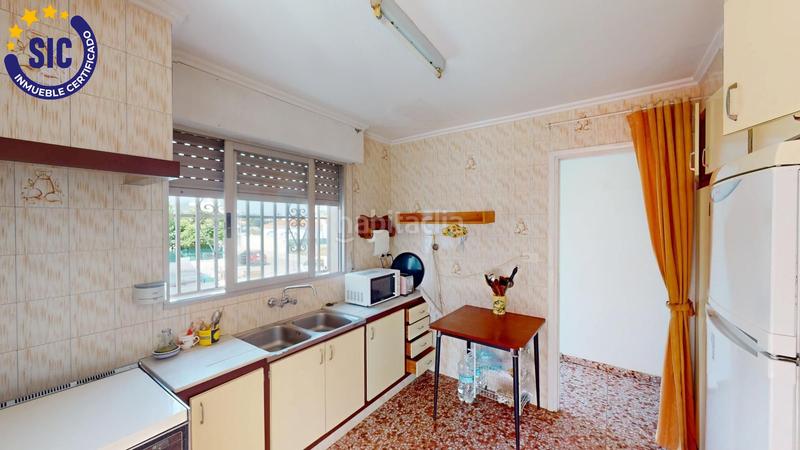 Foto 0cfc4a5c-db8e-4c71-ad5b-340bf3d5c4d4. Chalet en calle faig 16 chalet en playa sector 19 en Oliva