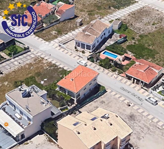 Foto 51b93a49-46ef-41c4-a96e-693729b1a891. Chalet en calle faig 16 chalet en playa sector 19 en Oliva