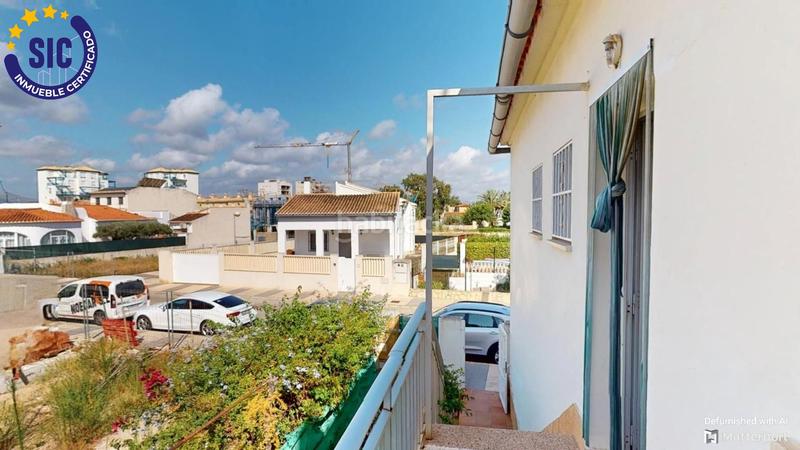 Foto ef9e8080-1782-49e7-a008-322e2428793a. Chalet en calle faig 16 chalet en playa sector 19 en Oliva