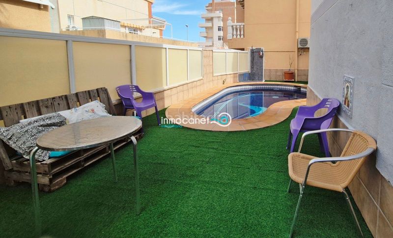 Foto 747fd9fb-0d20-4cbc-89b3-ee97131d541e. Maison jumelée avec chauffage parking piscine dans Oliva playa Oliva