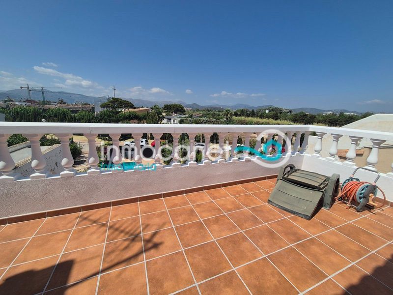 Foto c55a70cb-d696-4ac3-ba4f-7650c4c450e3. Casa adosada en Oliva nova Oliva