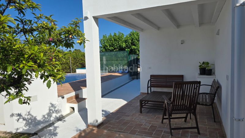 Foto 0d15eecf-ffd1-4699-919e-78e1e91f1d5a. Chalet en Oliva playa Oliva