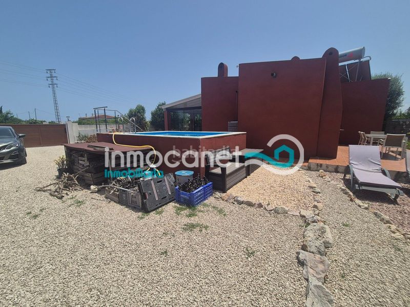 Foto ecc5ac9b-70ad-4d31-b62f-97430be78279. Xalet amb aparcament piscina a Oliva playa Oliva