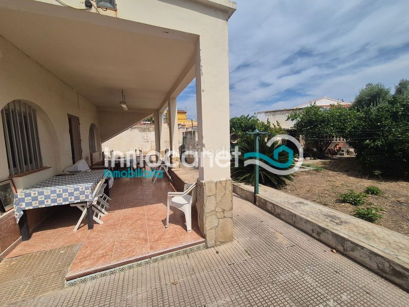 Foto c6ea198b-08af-454f-bfbe-329a7eada91f. Chalet en Oliva playa Oliva