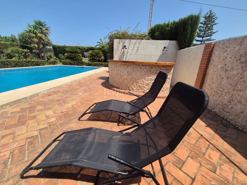 Foto 8ad8410e-d6bd-4d93-a879-5fdbf692b164. Chalet en Oliva playa Oliva