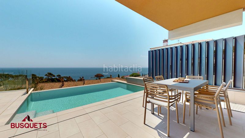 Foto 06e4fa6f-c182-4b8e-ad1a-a8cef95f7aa0. Casa pareada 180m<sup>2</sup> casa de alto standing con piscina privada a 2 min de la playa · en Tossa de Mar