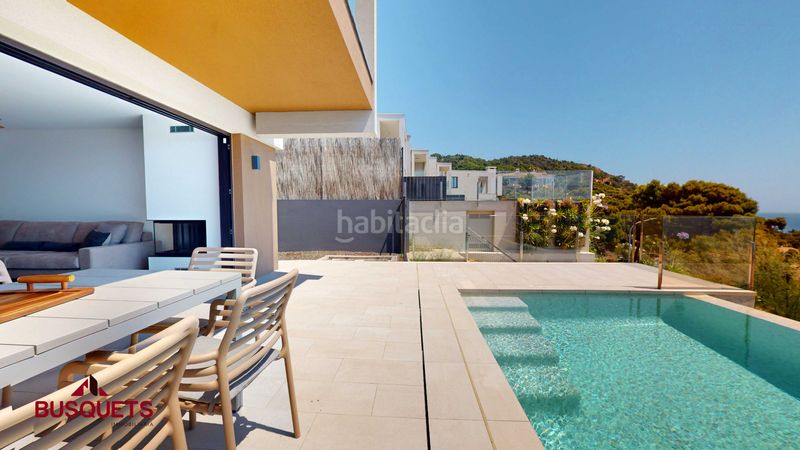 Foto fe8993c5-4e0f-4e7b-b619-82abef21f078. Casa pareada 180m<sup>2</sup> casa de alto standing con piscina privada a 2 min de la playa · en Tossa de Mar