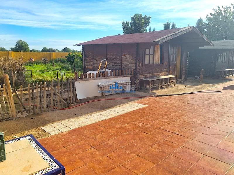 Foto 98c519e9-ec4c-40ec-8782-4ac0e9aa0592. Casa con piscina in Polígono del Aeropuerto Manises