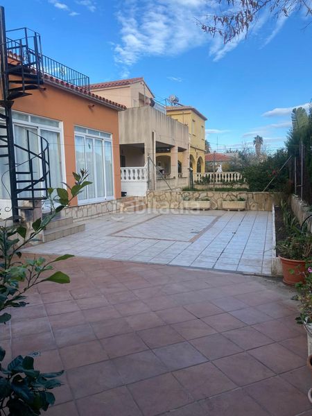 Foto 5aec1702-b4dd-44b5-a98b-27345eac28d2. Casa amb calefacció aparcament a Oliva playa Oliva