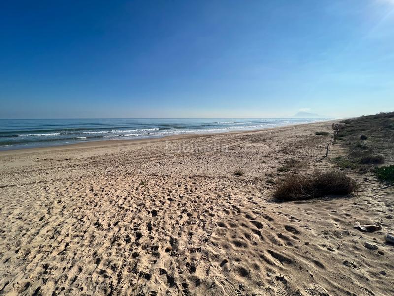 Foto c68cb394-efab-4bb7-aae1-a5ab99f42529. Chalet en carrer vela en Oliva playa Oliva