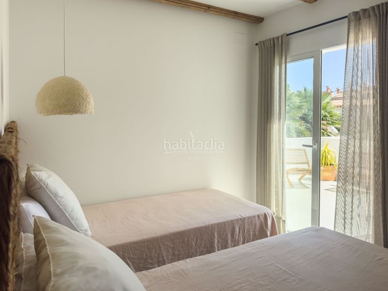 Foto 5b78f838-fe45-4ffe-a375-b0c2c31953d0. Casa adossada amb calefacció piscina a Les Bassetes - El Marjal Dénia