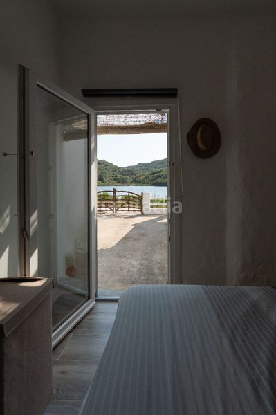 Foto d52fcc7f-03b8-4899-83db-90c64359f84d. Casa amb xemeneia calefacció aparcament a Cala Llonga-Sa Mesquida Maó / Mahón