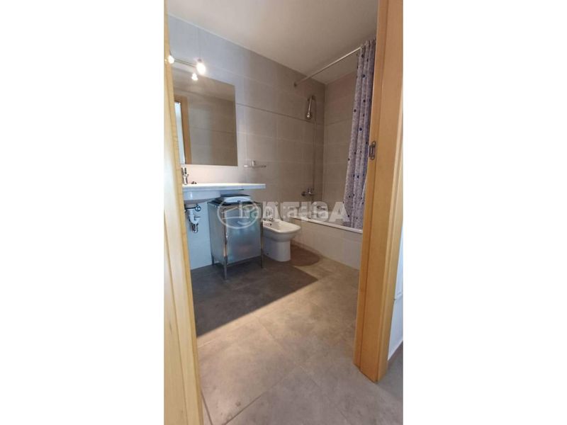 Foto 237c35dc-39fb-4108-8024-ac495bb9e1b4. Pis amb calefacció aparcament a Caldes de Malavella