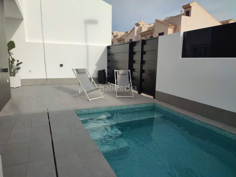 Foto bad6bc0b-5170-4cd8-9316-1ae6608aff65. Chalet villa de obra nueva con 3 dormitorios,2 baños, solárium y piscina privada. en Balsicas, murcia. en Torre - Pacheco