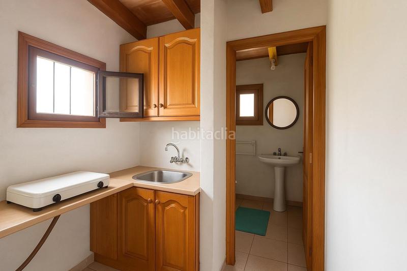 Foto cd845d8a-b759-4124-98d6-d9b330e84c94. Mas avec cheminée chauffage dans Santa Eugènia