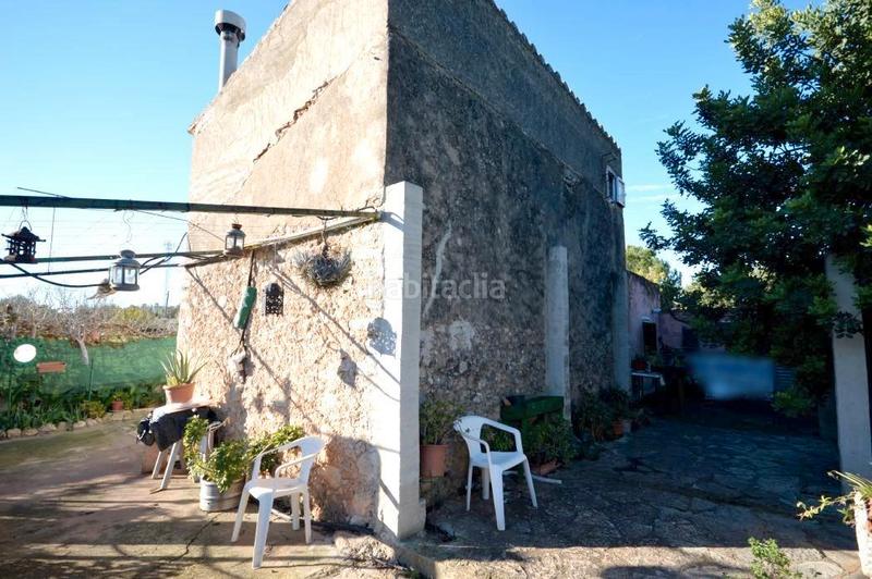 Foto 1002f6ff-5f5c-4ec8-8e34-c564df68719c. Bauernhof mit kamin heizung in Lloseta