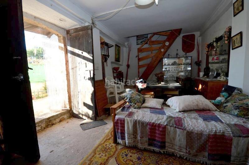 Foto f7c74717-ee7a-41fb-aab0-4ec8b5590628. Bauernhof mit kamin heizung in Lloseta